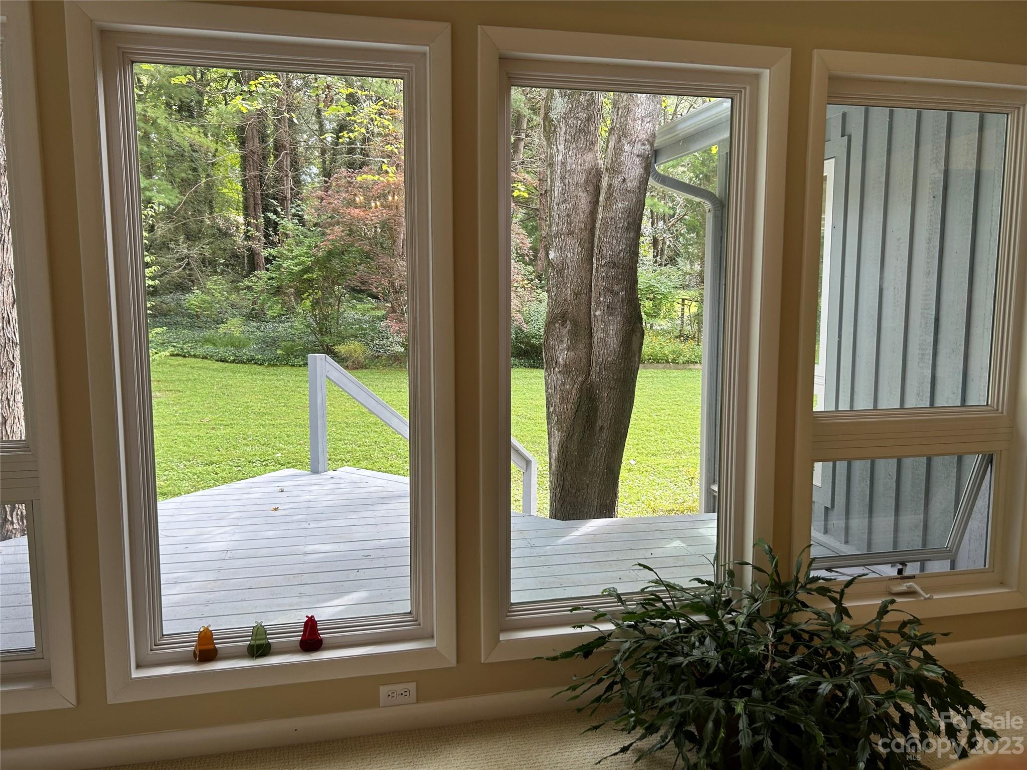 428 Brandon Road Hendersonville, NC 28739 - Photo 12 of 48 a view of a garden from a windows