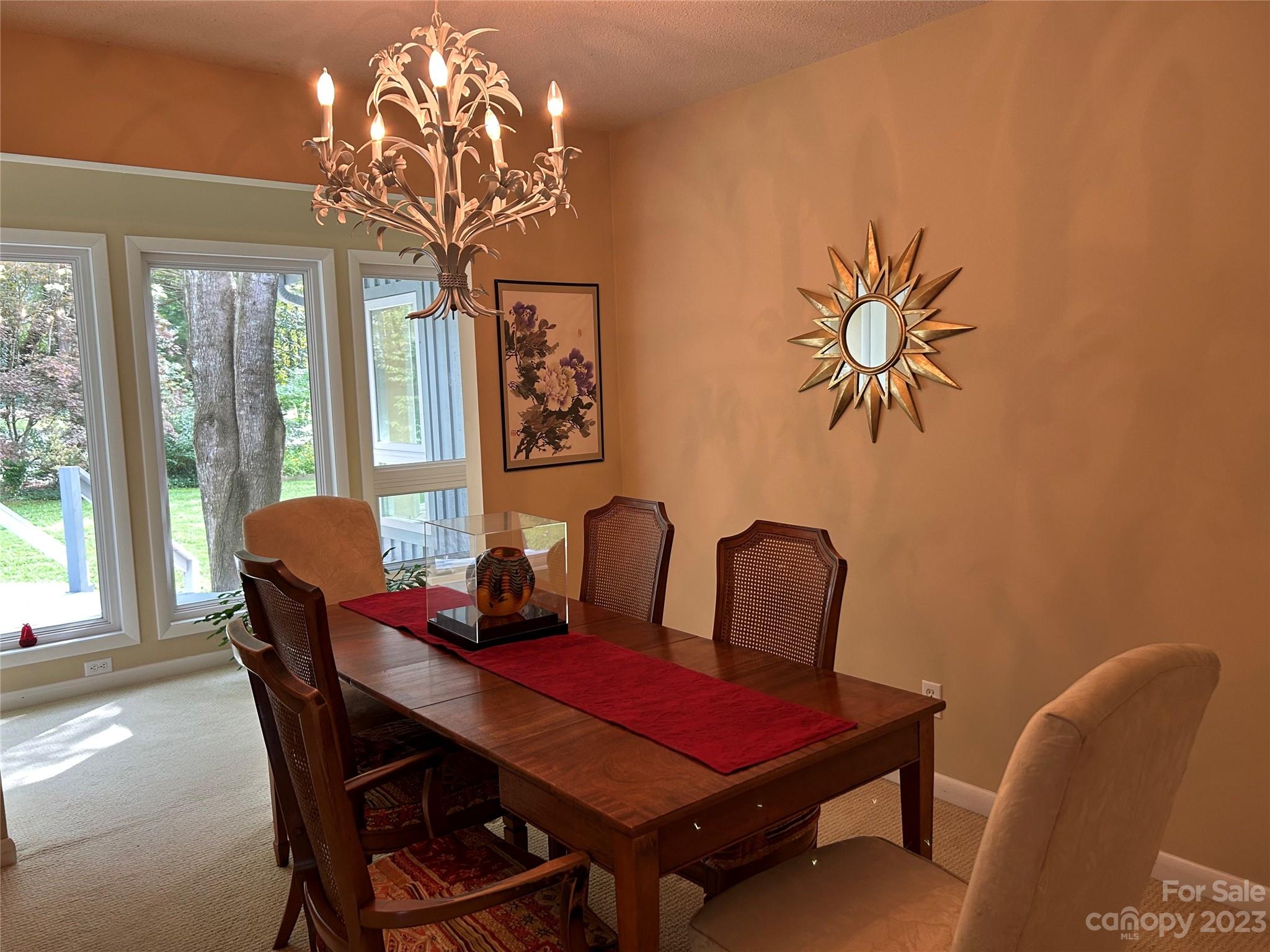 428 Brandon Road Hendersonville, NC 28739 - Photo 13 of 48 a dining room with furniture and window