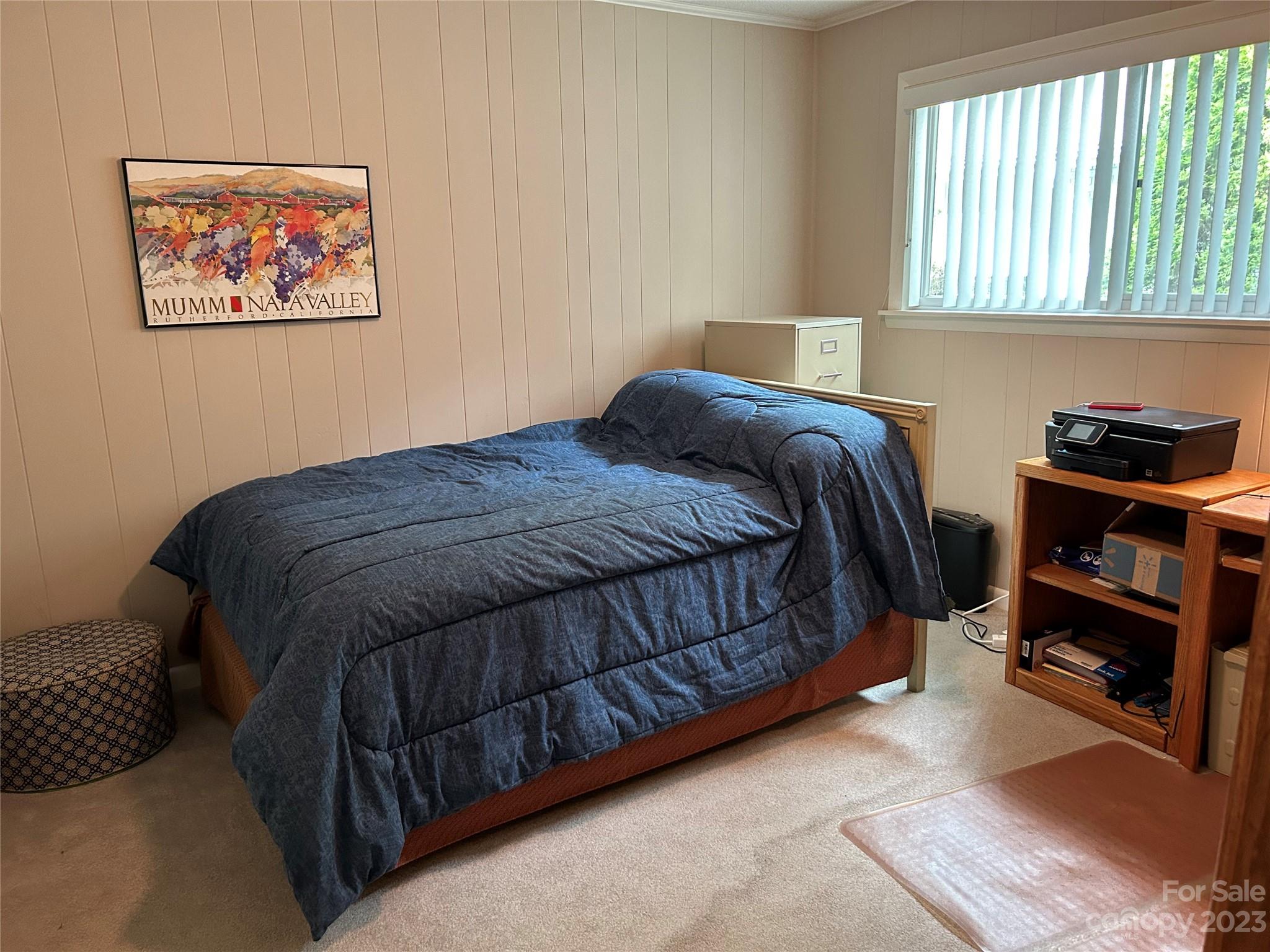 428 Brandon Road Hendersonville, NC 28739 - Photo 36 of 48 a bedroom with a bed and a window