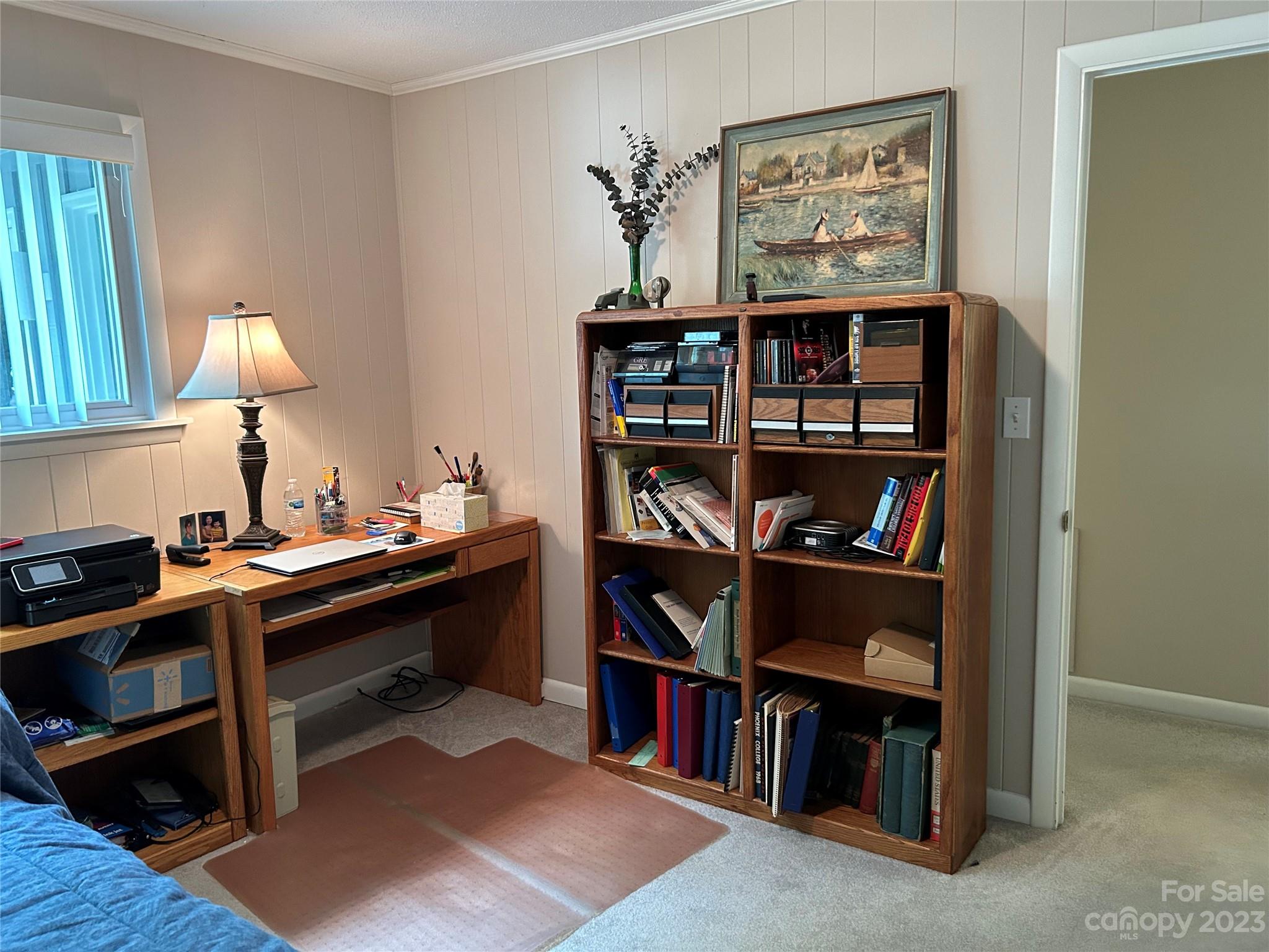 428 Brandon Road Hendersonville, NC 28739 - Photo 38 of 48 a view of a workspace with furniture and cabinet