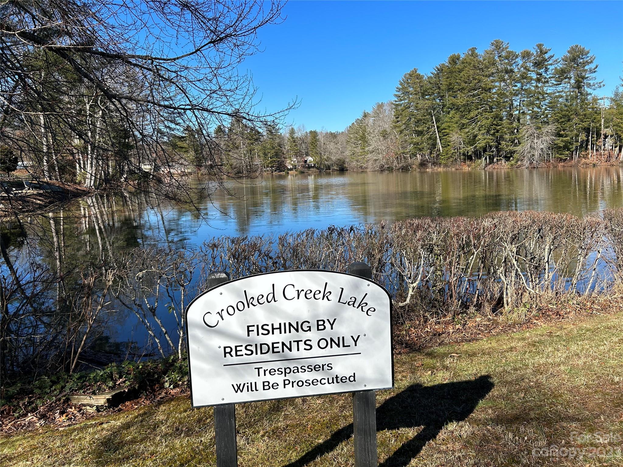 428 Brandon Road Hendersonville, NC 28739 - Photo 45 of 48 a sign on the side of the river