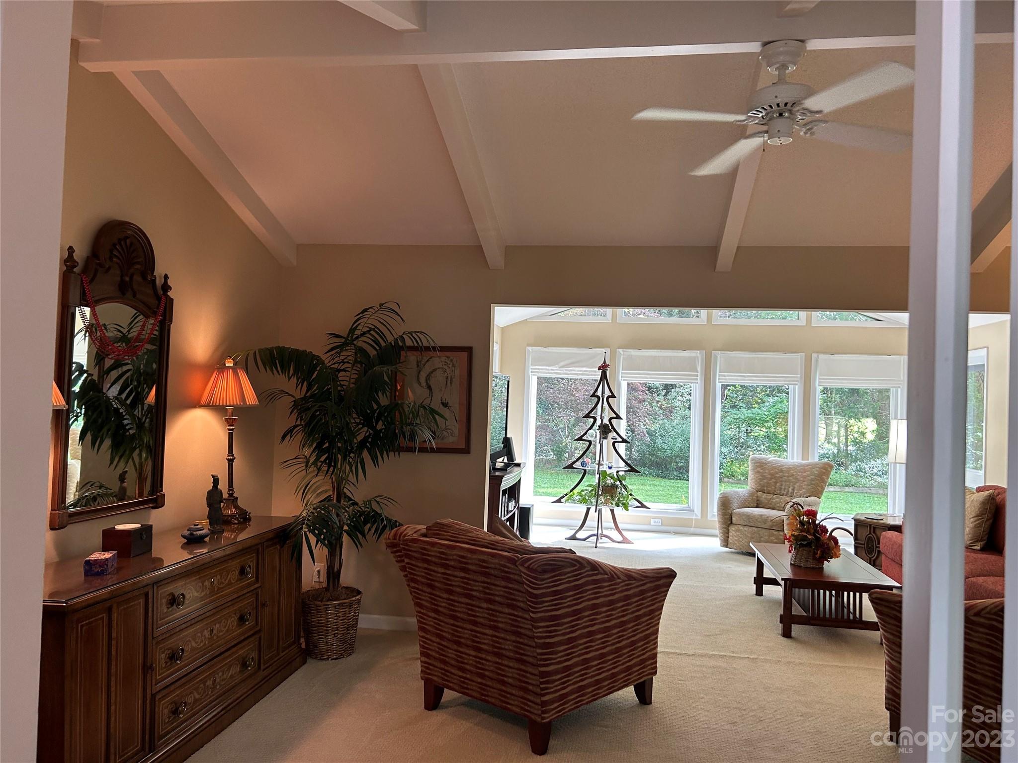 428 Brandon Road Hendersonville, NC 28739 - Photo 5 of 48 a living room with furniture a large window with outer view