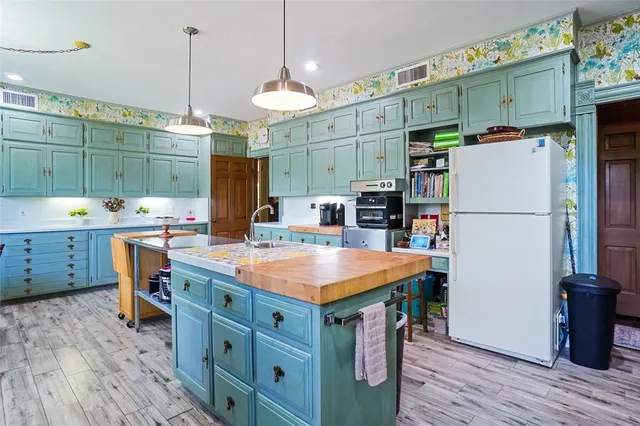 a view of a livingroom with furniture and a window