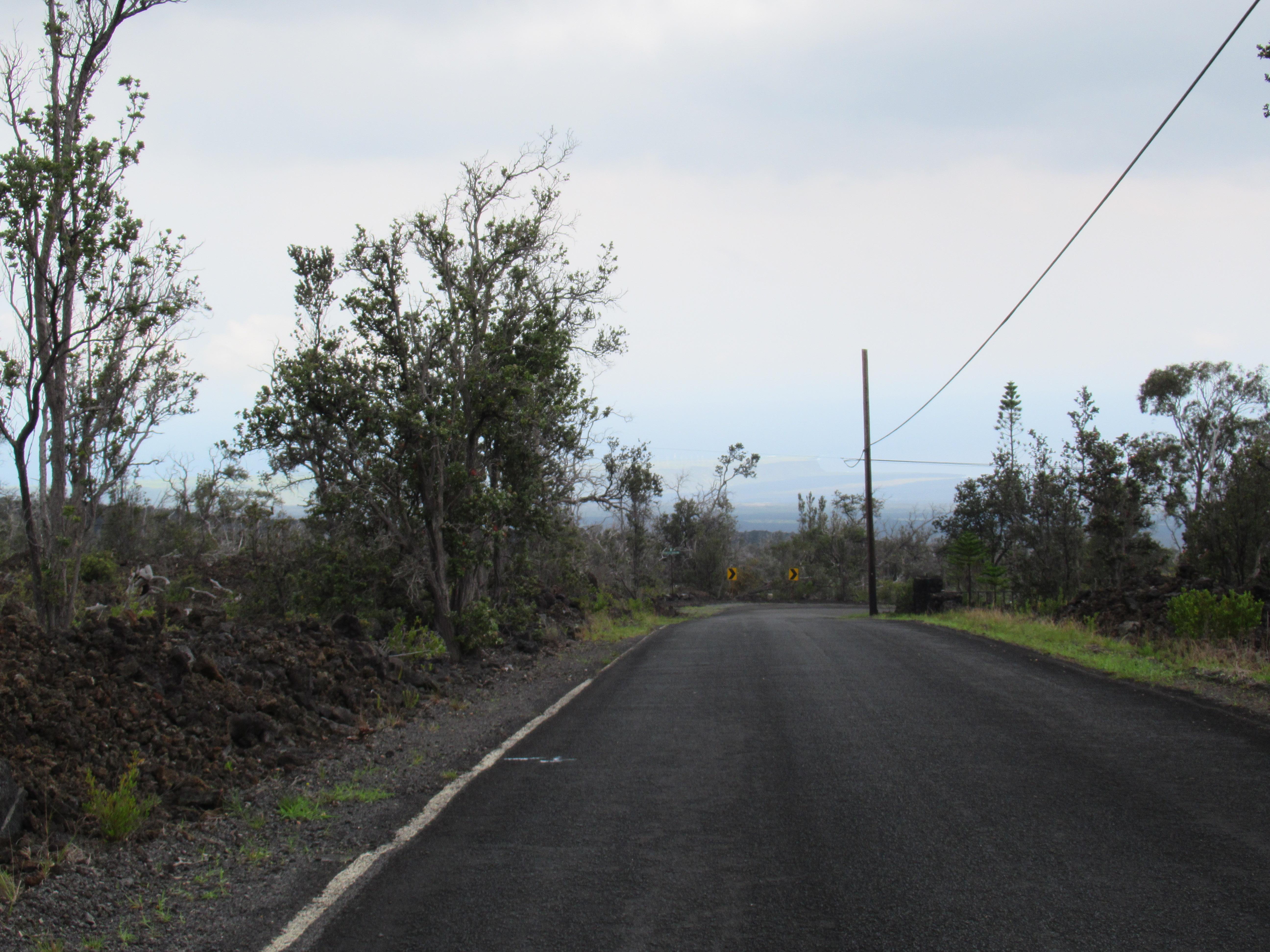 17 Koa Lane Ocean View, HI 96704 - Photo 2 of 5 a view of a road from a yard