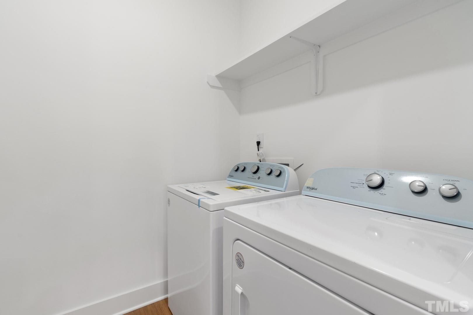 6108 Fox Road Raleigh, NC 27616 - Photo 14 of 40 a utility room with dryer and washer