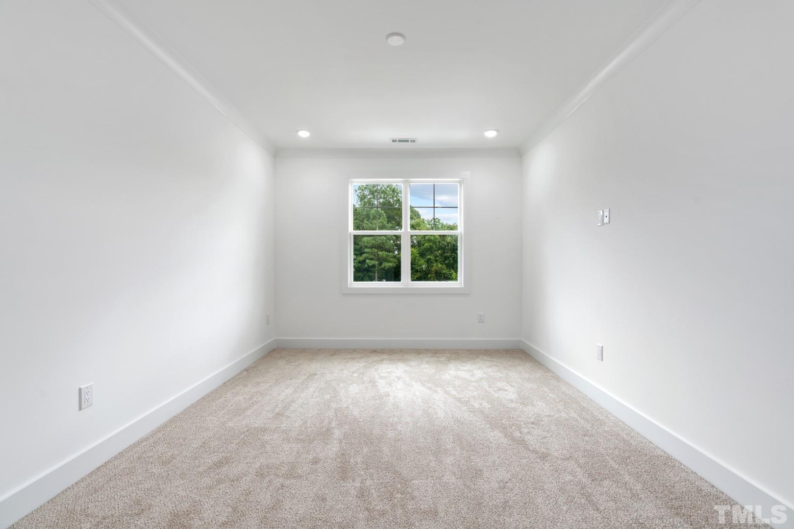 6108 Fox Road Raleigh, NC 27616 - Photo 37 of 40 an empty room with windows