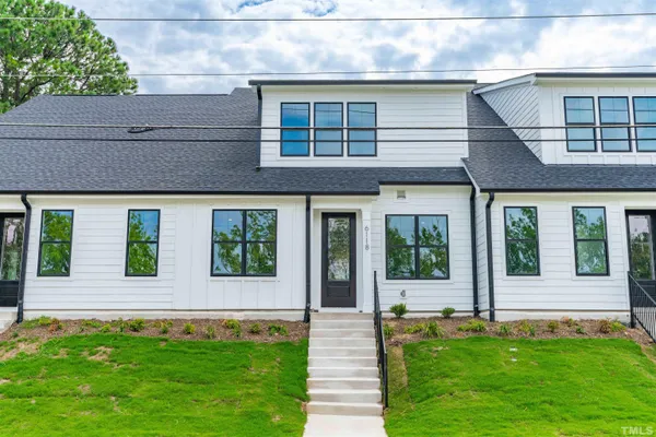 a view of house with yard
