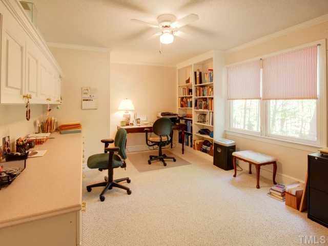 10209 Whitestone Road Raleigh, NC 27615 - Photo 7 of 25 Main level office with built-in shelving