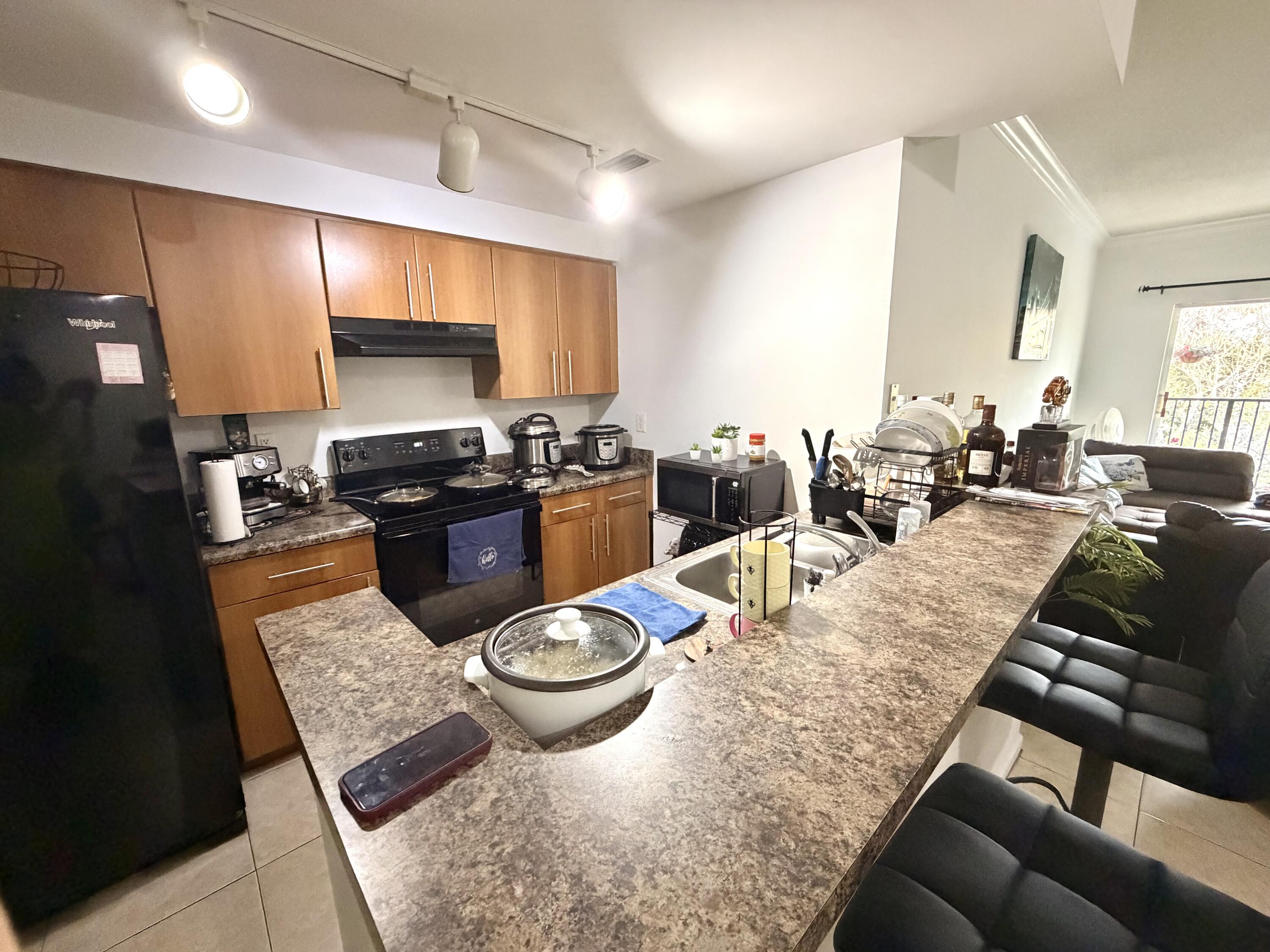 6020 West Sample Road, Unit 303 Coral Springs, FL 33067 - Photo 7 of 17 IMG_4894