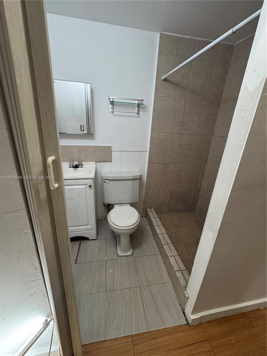 3271 (rear Studio) Nw 15th Street Miami, FL 33125 - Photo 8 of 11 a bathroom with a sink and a toilet