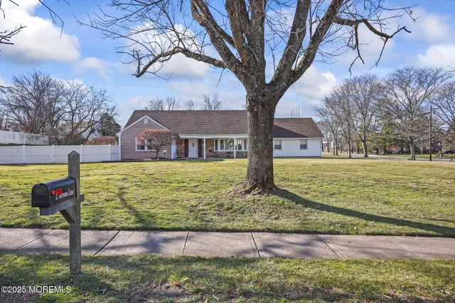 a view of swimming pool with a yard