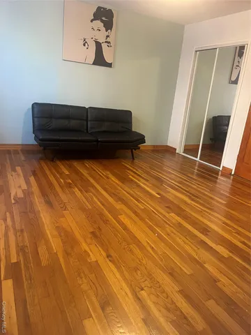 a bedroom with a bed and a walk in closet