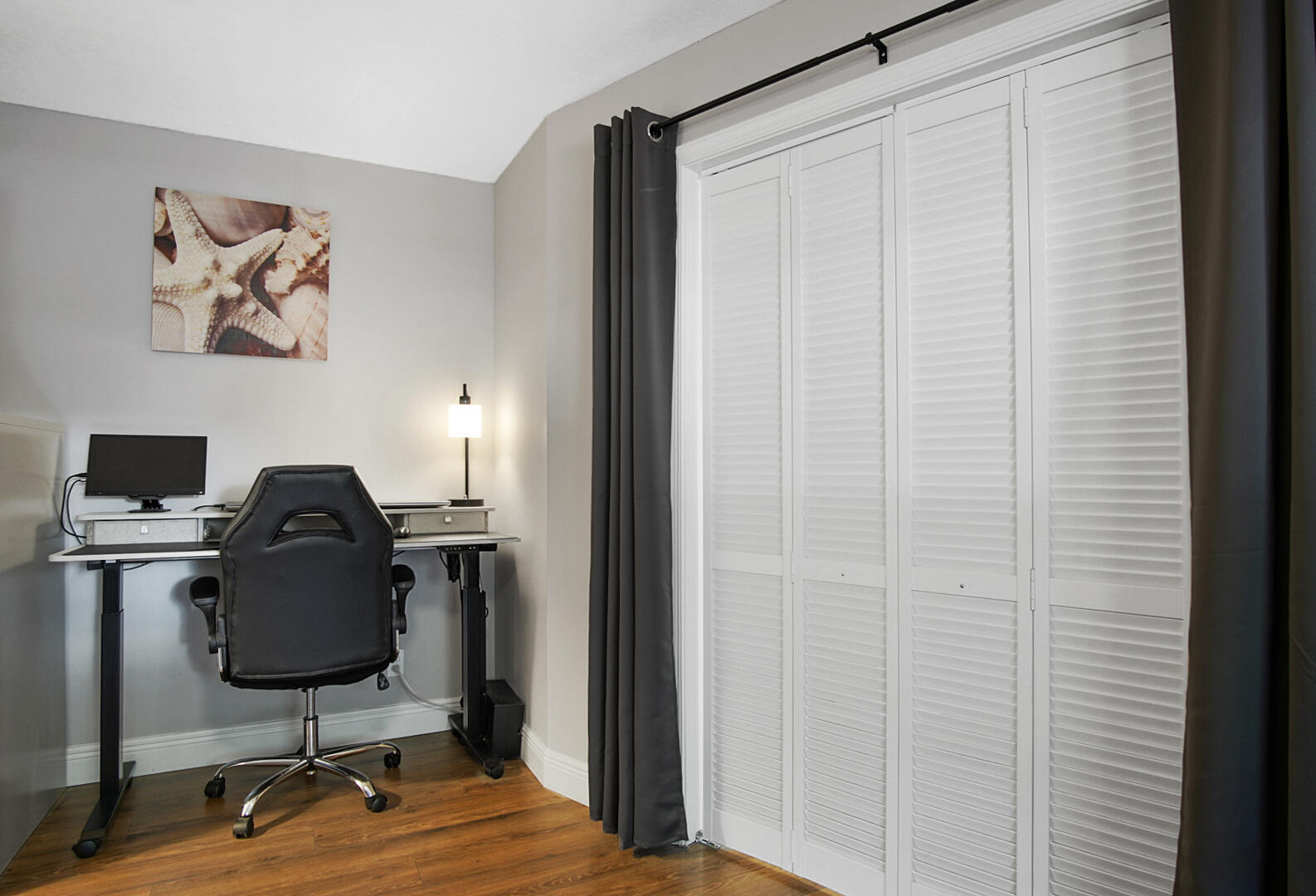 17308 Boca Club Boulevard, Unit 1102 Boca Raton, FL 33487 - Photo 23 of 48 a living room with furniture and wooden floor
