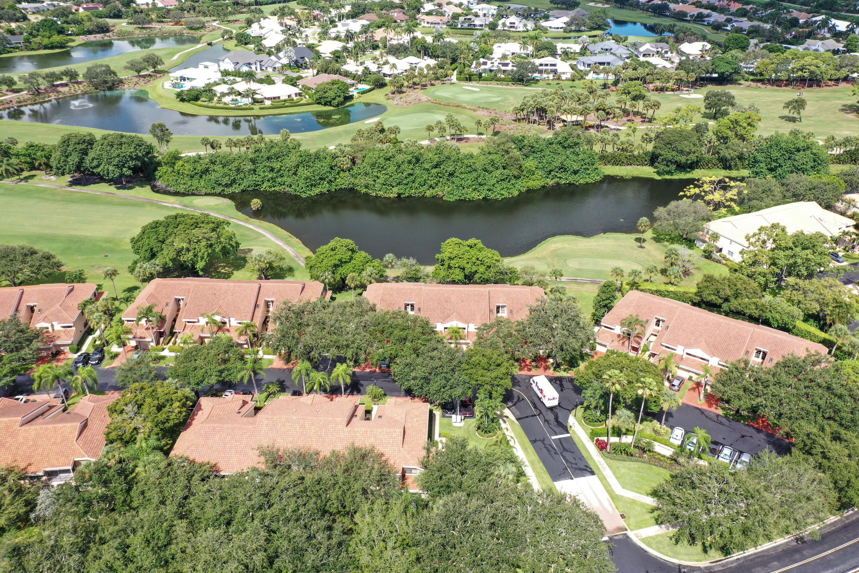17308 Boca Club Boulevard, Unit 1102 Boca Raton, FL 33487 - Photo 34 of 48 an aerial view of a houses with outdoor space and street view