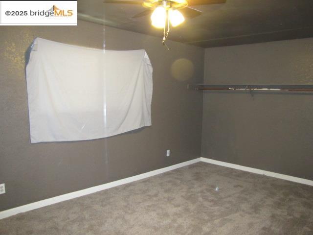 1943 South Ranchero Road Valley Springs, CA 95252 - Photo 17 of 23 Carpeted spare room featuring baseboards and a ceiling fan