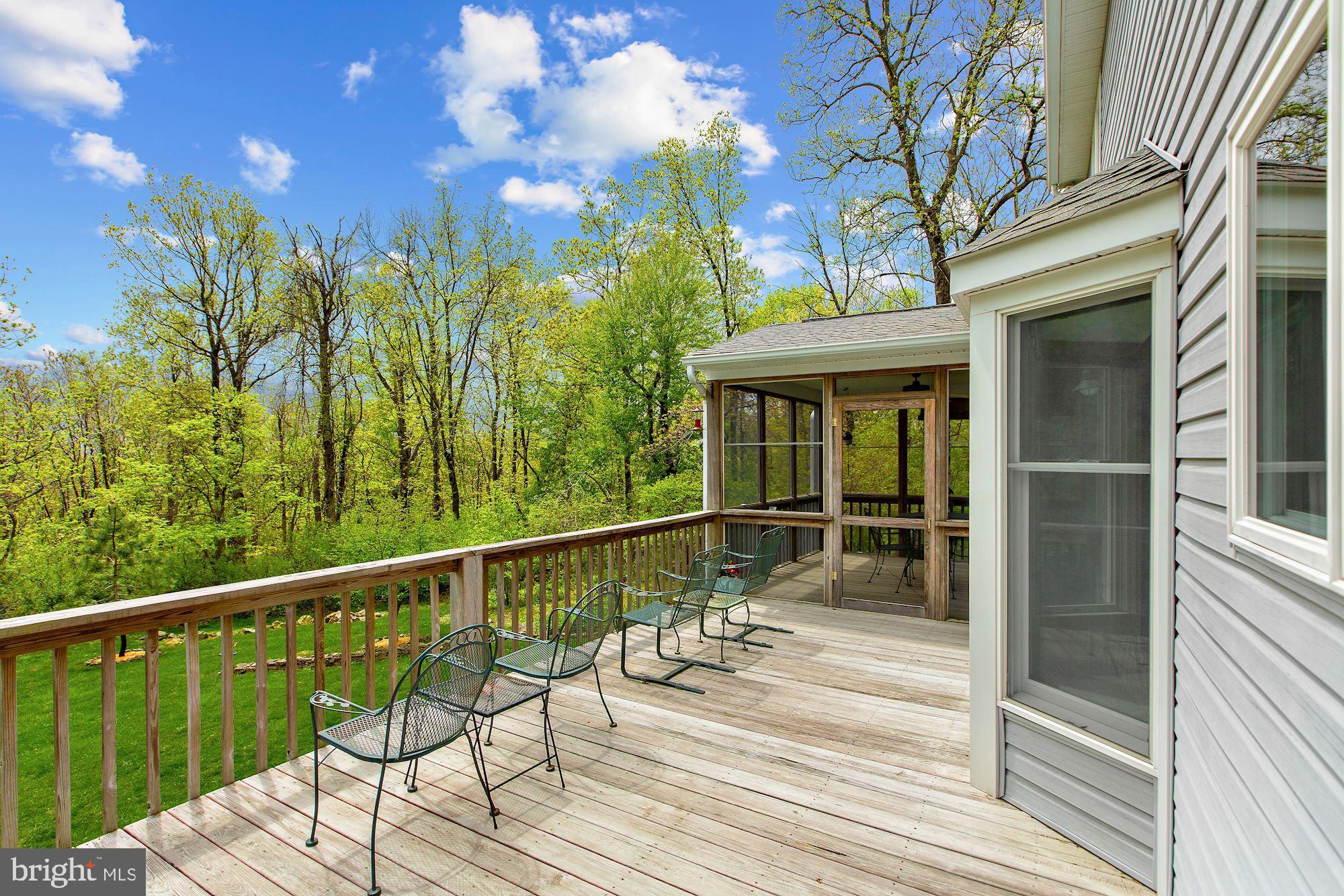 17914 Raven Rocks Road Round Hill, VA 20141 - Photo 6 of 40 Deck & Screened Porch overlooking land