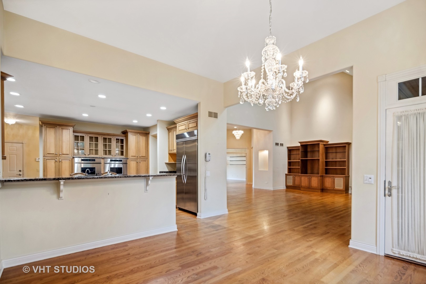 311 Pinehurst Drive Palos Heights, IL 60463 - Photo 14 of 24 a view of a livingroom with kitchen and dining space