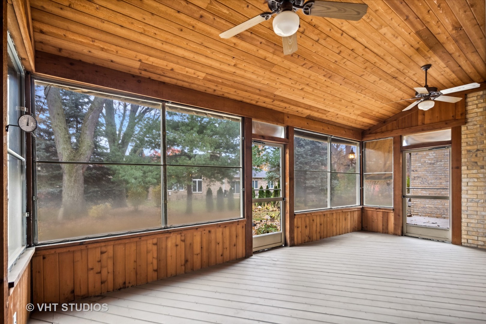 311 Pinehurst Drive Palos Heights, IL 60463 - Photo 16 of 24 a view of empty room with wooden floor and fan