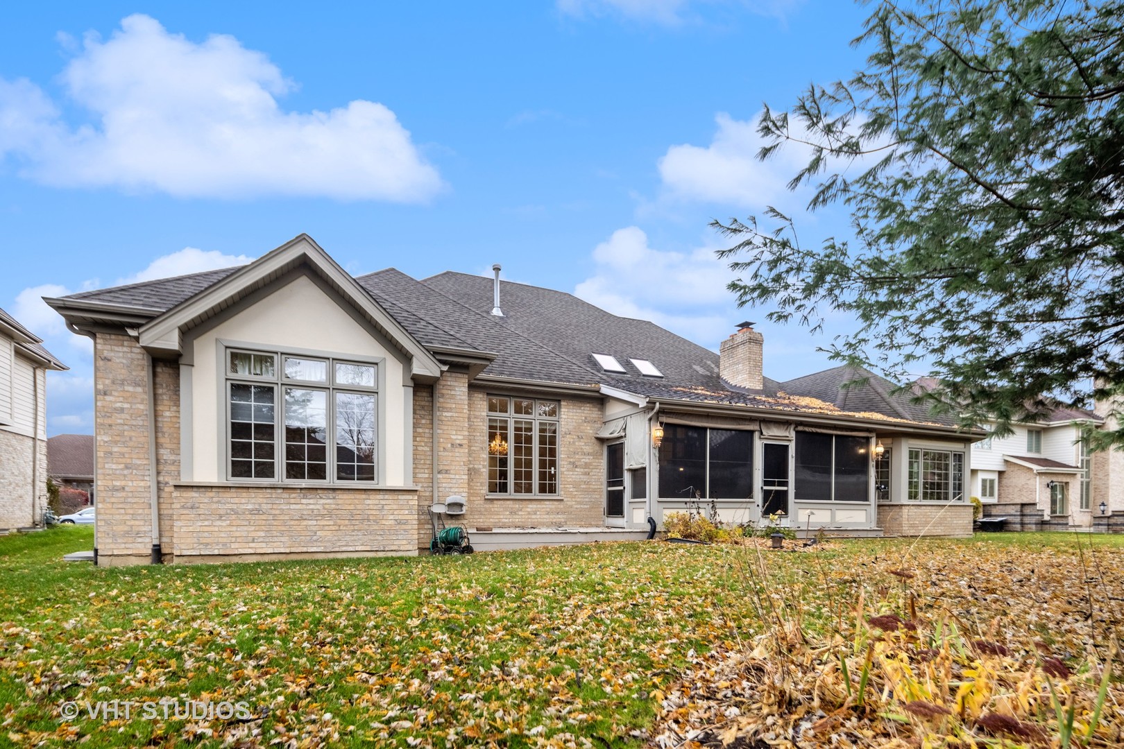 311 Pinehurst Drive Palos Heights, IL 60463 - Photo 2 of 24 a front view of a house with a garden