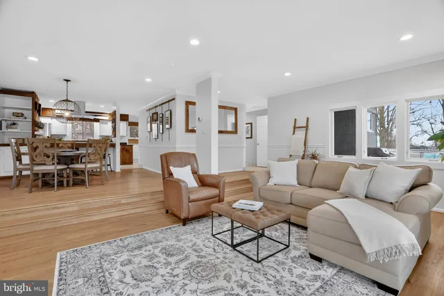 a spacious bedroom with a bed and a window
