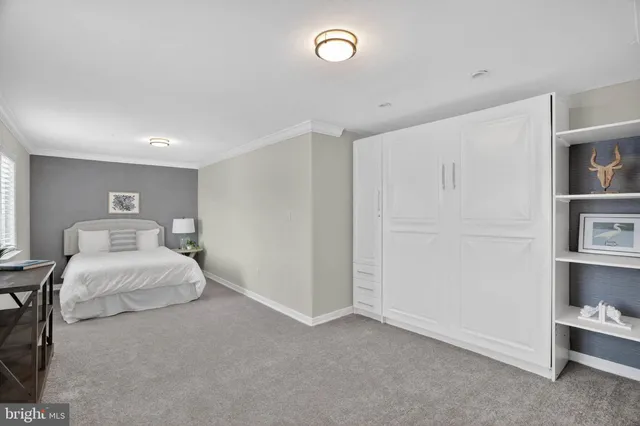 a view of a swimming pool with an outdoor seating and a mountain view