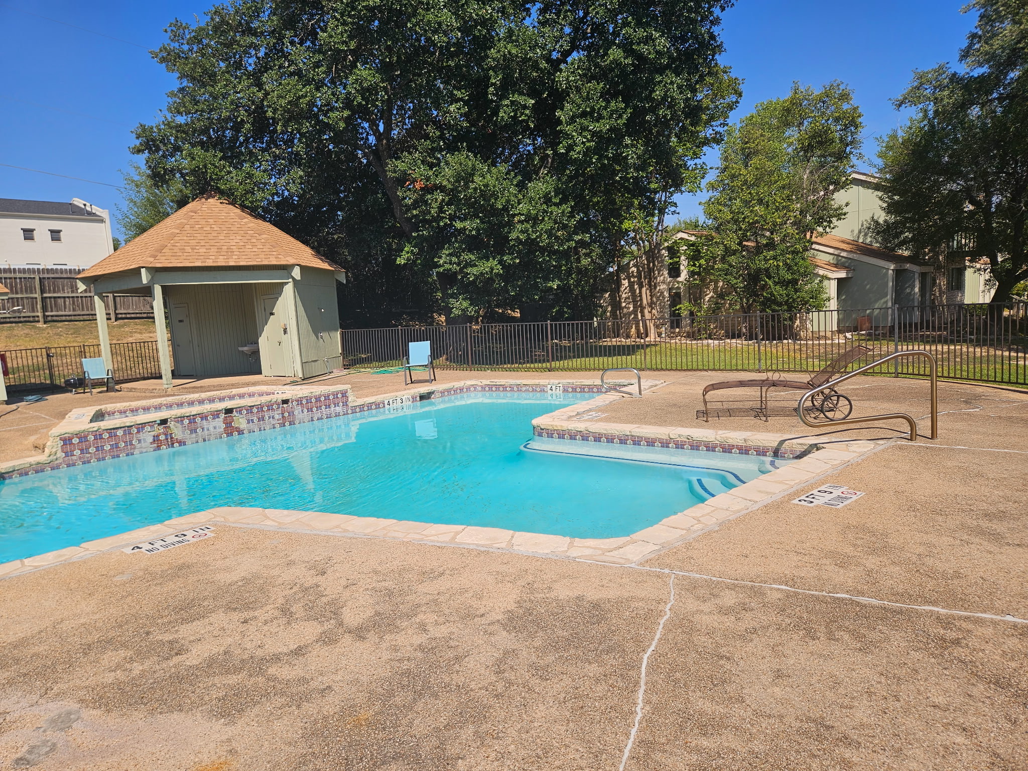 500 Hesters Crossing Road, Unit 110 Round Rock, TX 78681 - Photo 3 of 4 Community pool with a patio, a gazebo, and an outbuilding