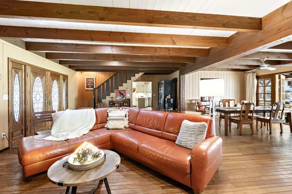 a dining room with furniture and a fireplace