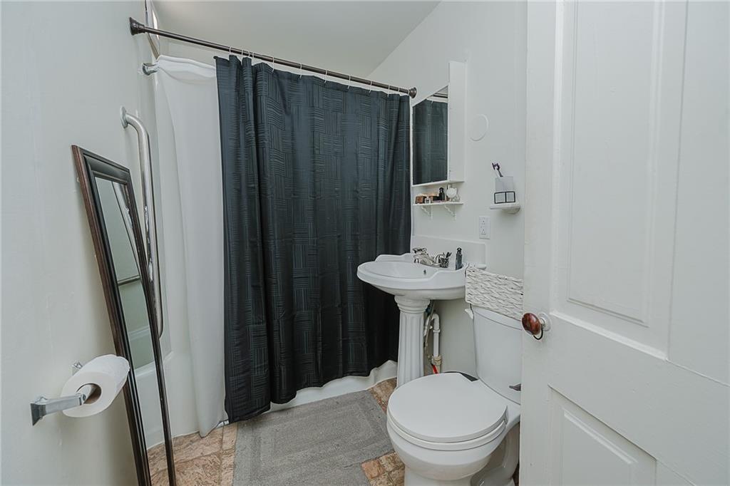 916 Main Street East Rural Valley, PA 16249 - Photo 15 of 32 a bathroom with a sink toilet and shower