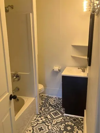 a bathroom with a sink and a tub