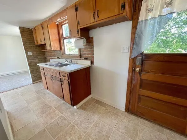 a bathroom with a sink a toilet and a bathtub