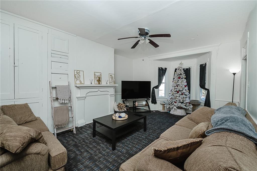 916 Main Street East Rural Valley, PA 16249 - Photo 7 of 32 a living room with furniture and a flat screen tv