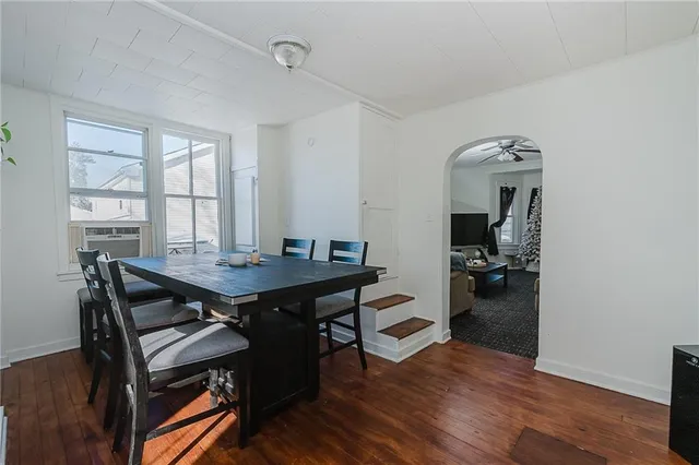 a view of a livingroom with furniture and window