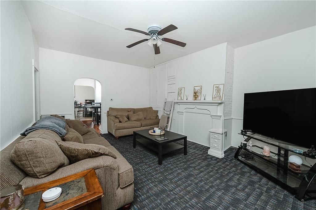 916 Main Street East Rural Valley, PA 16249 - Photo 9 of 32 a living room with furniture and a flat screen tv
