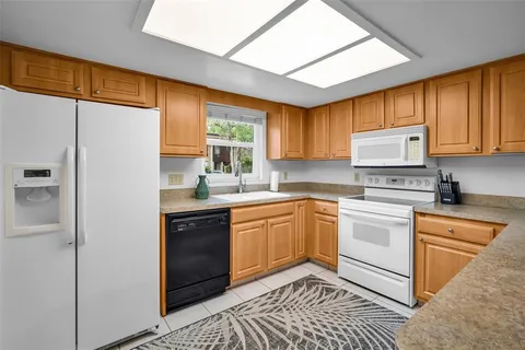 $219,000 | 1400 Tarpon Woods Boulevard, Unit A4, Palm Harbor, FL 34685