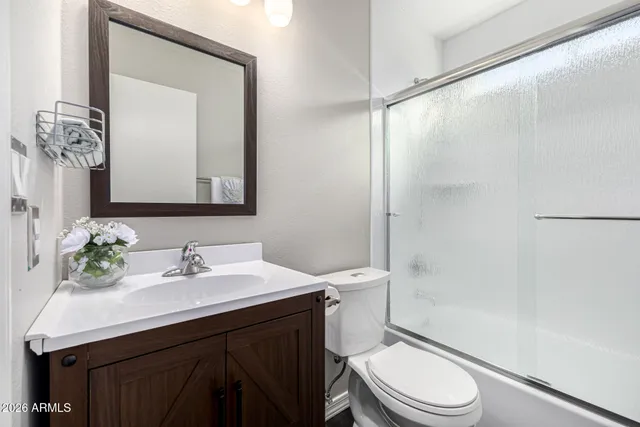 an empty room with wooden floor