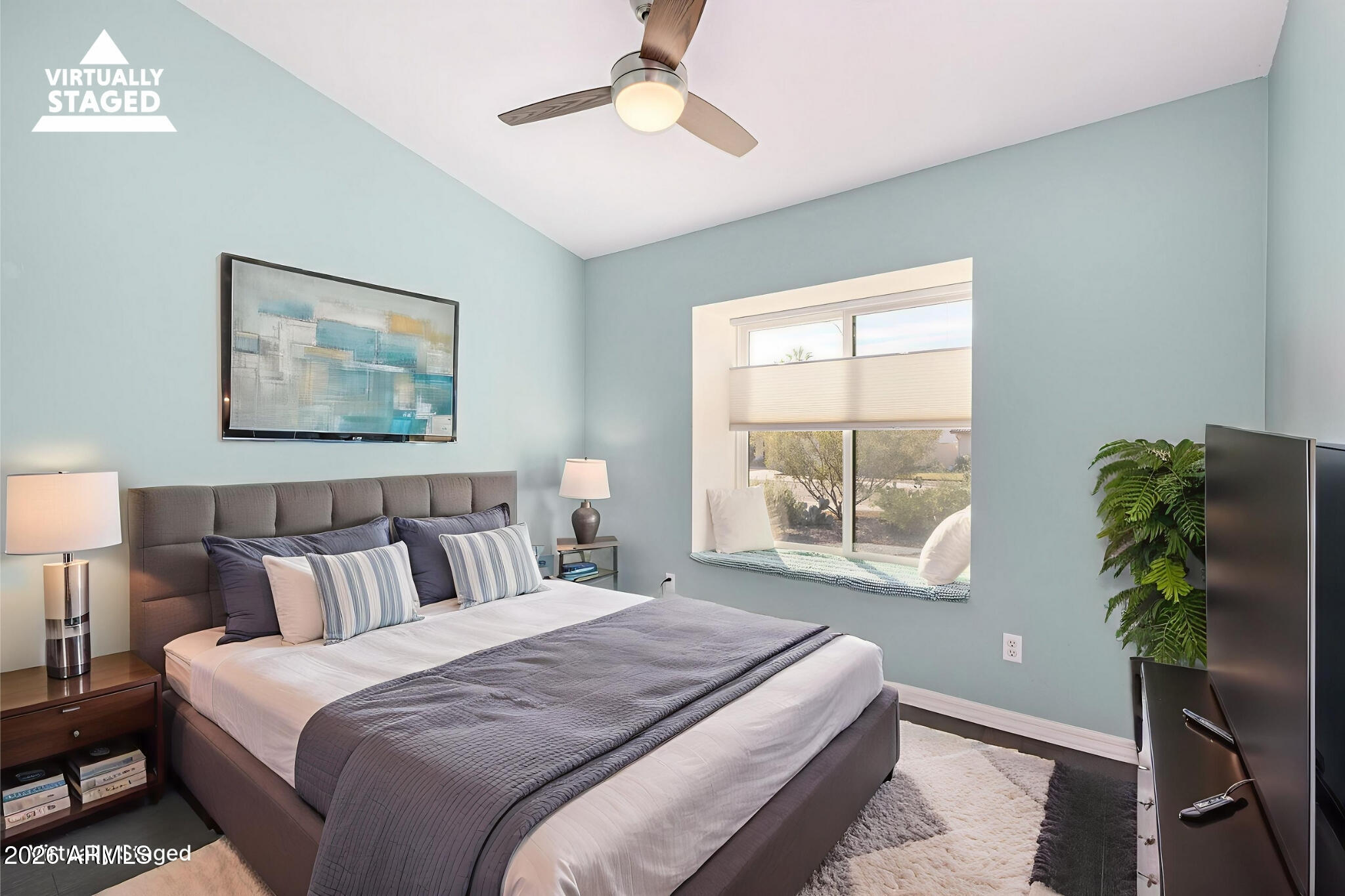 2710 East Rock Wren Road Phoenix, AZ 85048 - Photo 24 of 56 a bedroom with a large bed and a window