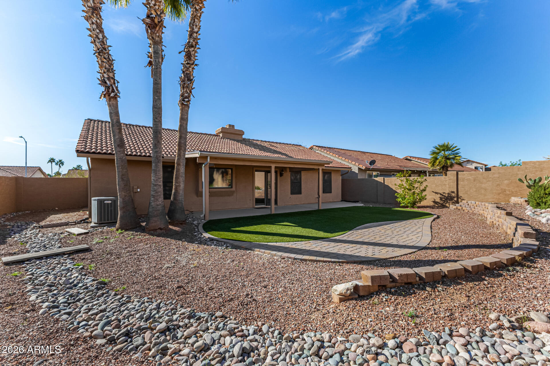 2710 East Rock Wren Road Phoenix, AZ 85048 - Photo 33 of 56 a view of a house with a backyard
