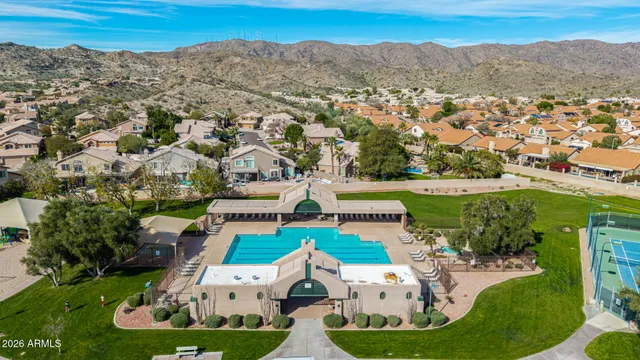an aerial view of a house with a garden
