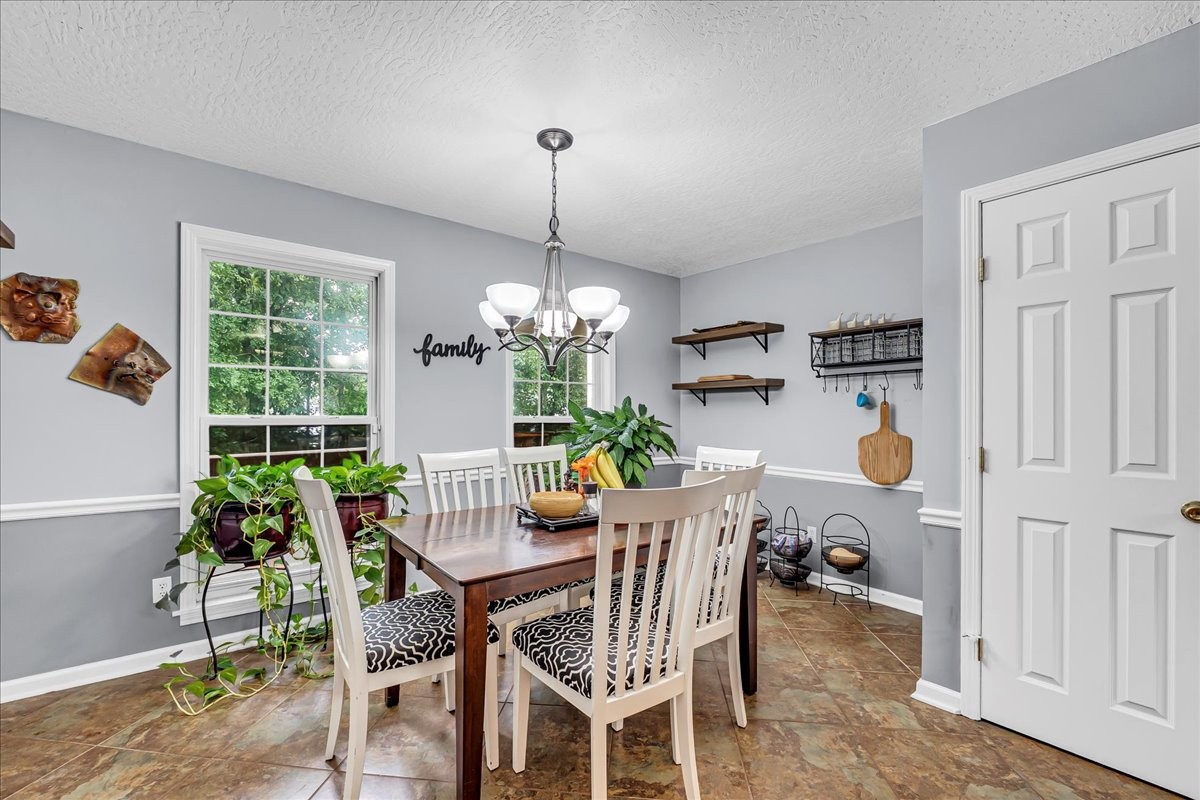 3955 River Road Baxter, TN 38544 - Photo 22 of 78 a view of a dining room with furniture window and outside view
