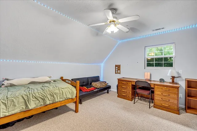 a balcony with wooden floor and outdoor space