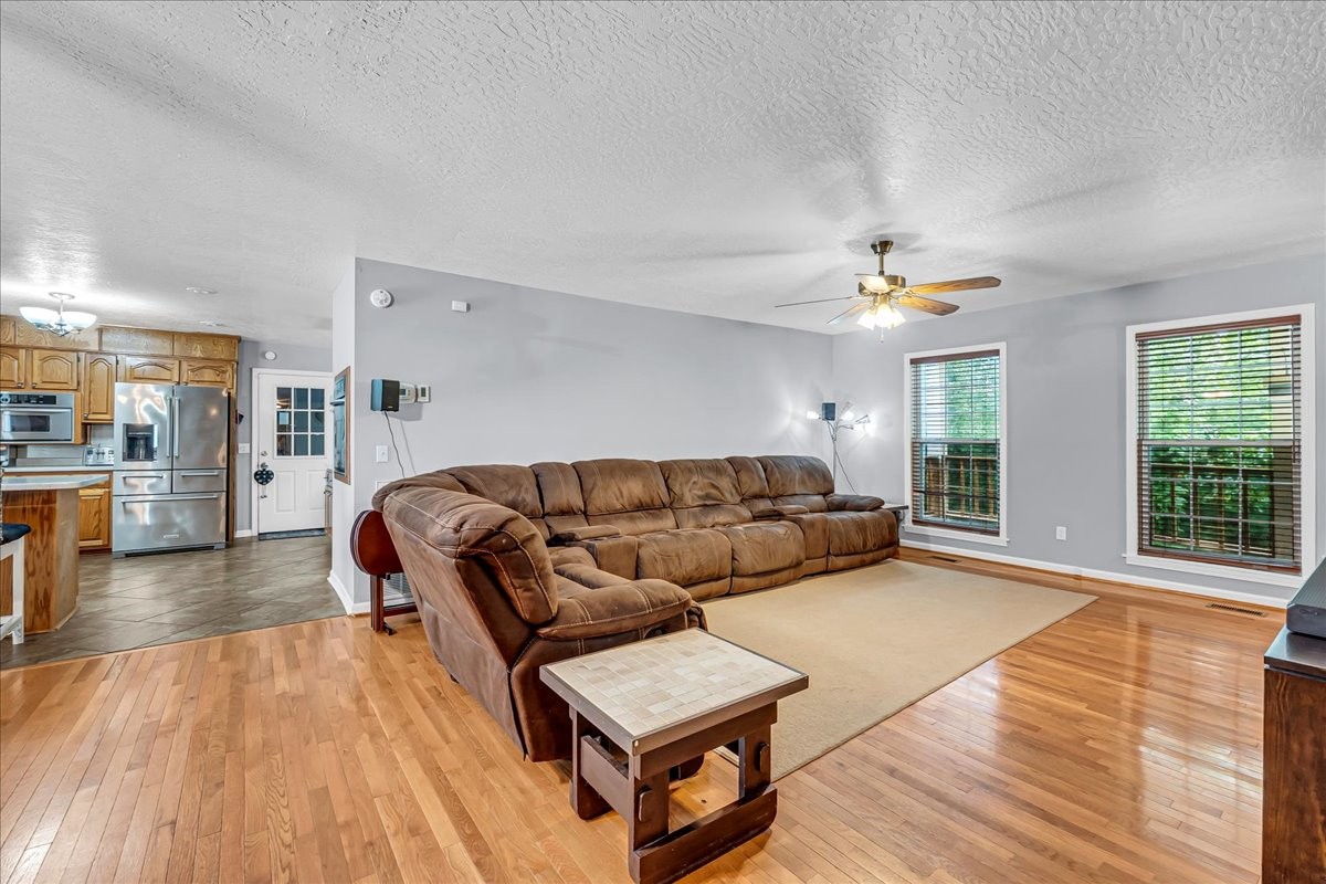 3955 River Road Baxter, TN 38544 - Photo 5 of 78 a living room with furniture and a wooden floor