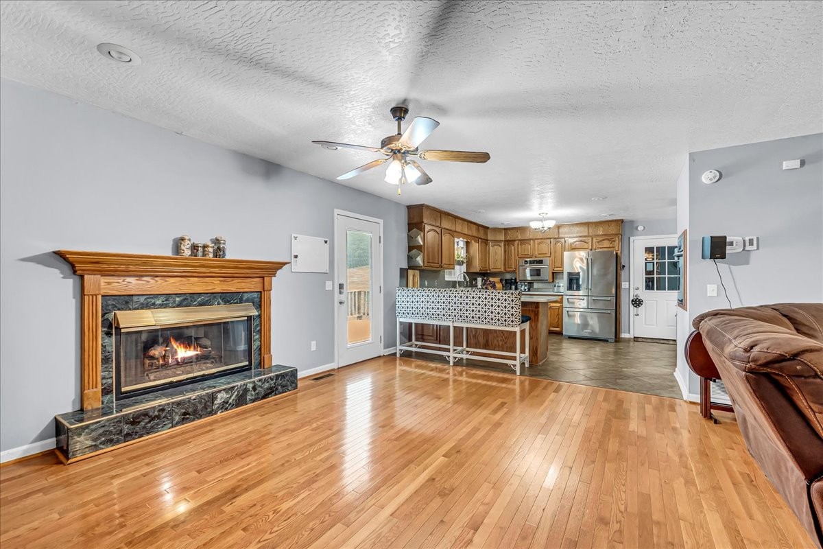3955 River Road Baxter, TN 38544 - Photo 6 of 78 a living room with furniture and a fireplace