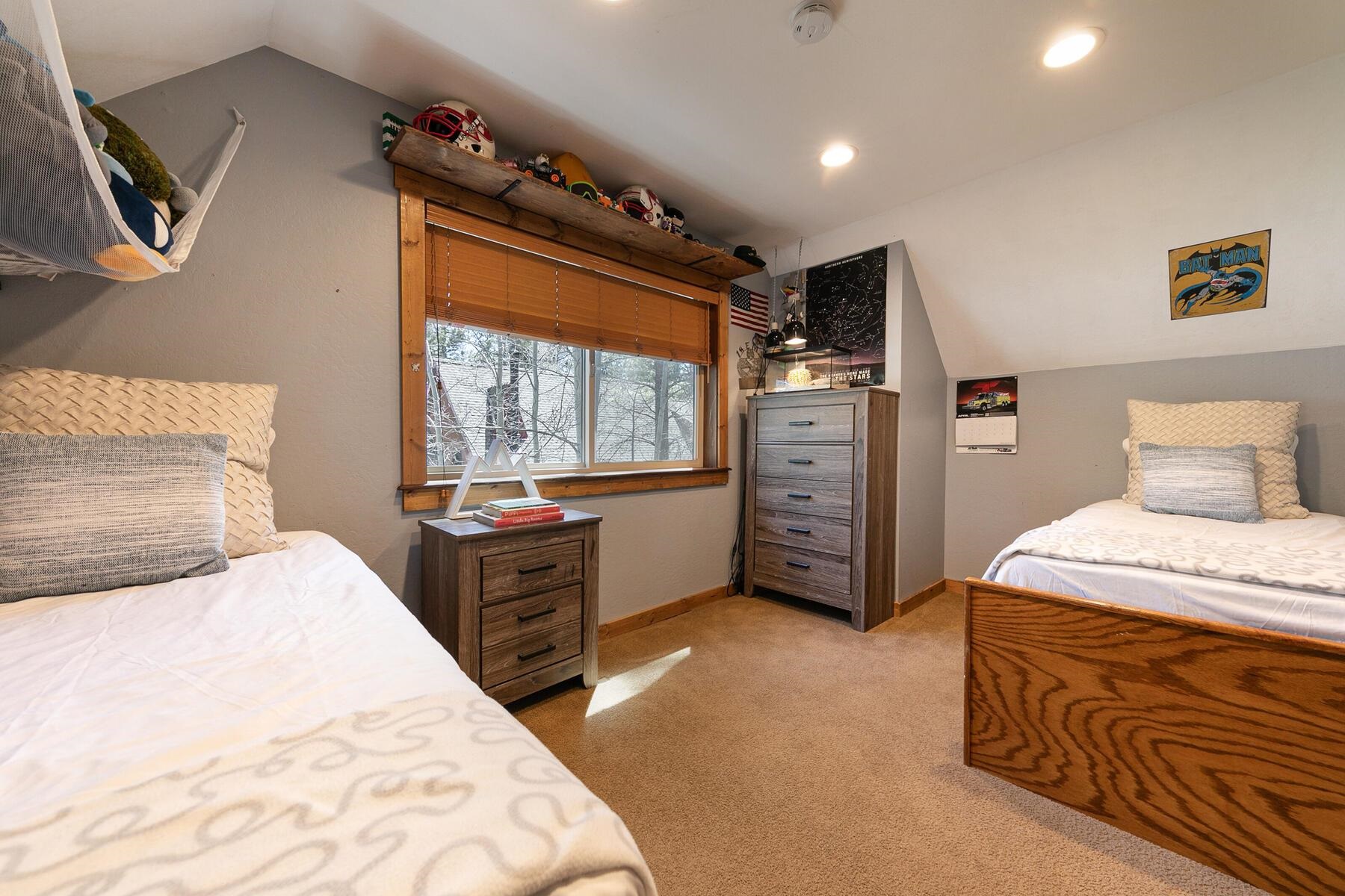 10243 Laburnham Circle Truckee, CA 96161 - Photo 15 of 21 a bedroom with a bed and a large window