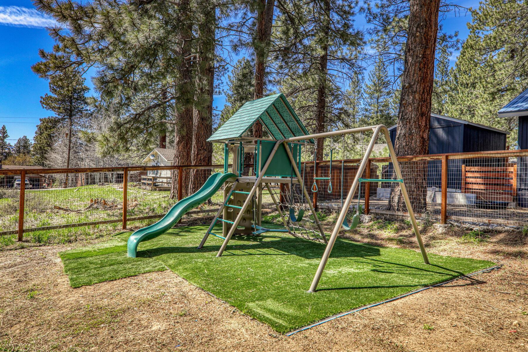 10243 Laburnham Circle Truckee, CA 96161 - Photo 17 of 21 a view of a house with a park