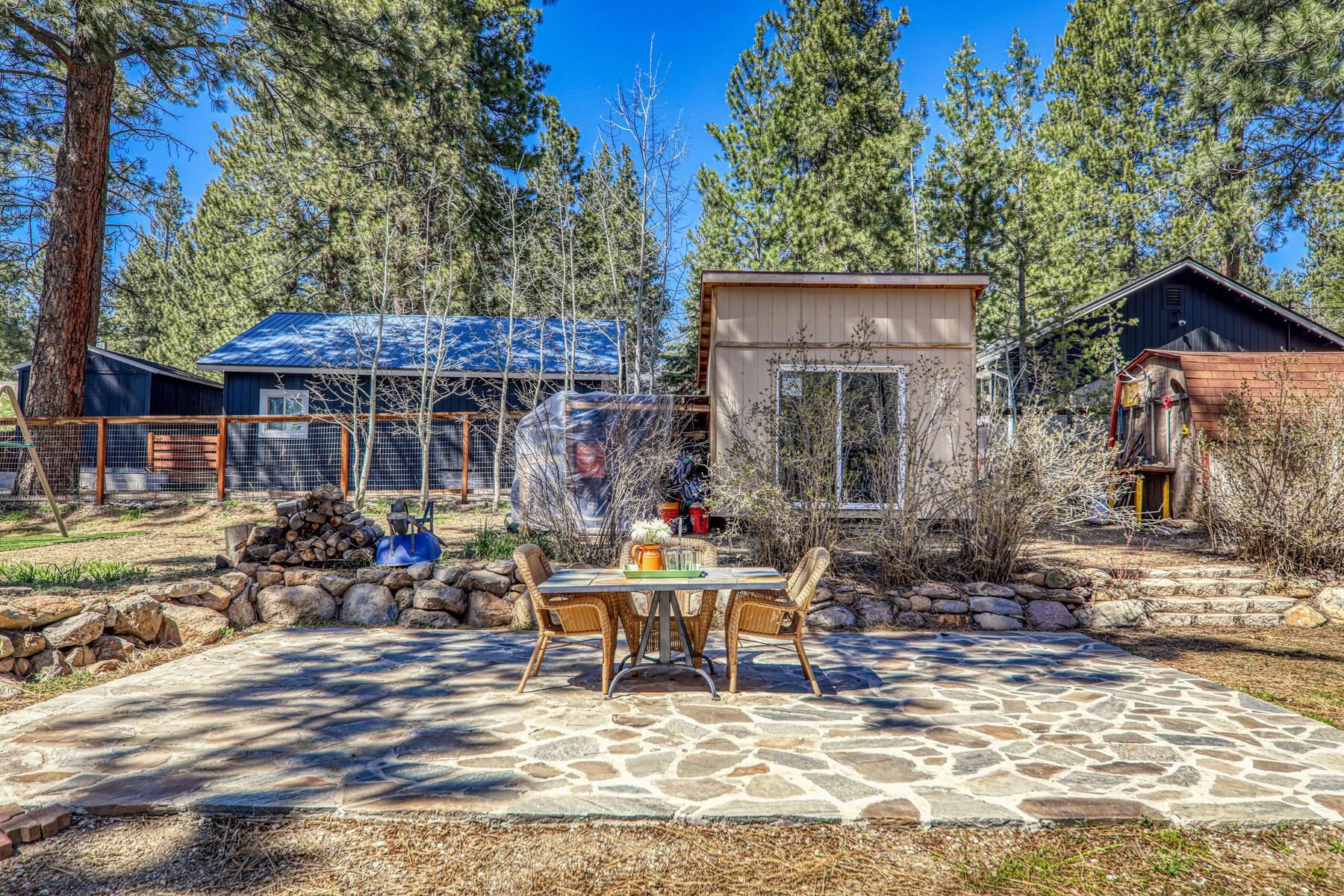 10243 Laburnham Circle Truckee, CA 96161 - Photo 18 of 21 a chairs and table in front of a house