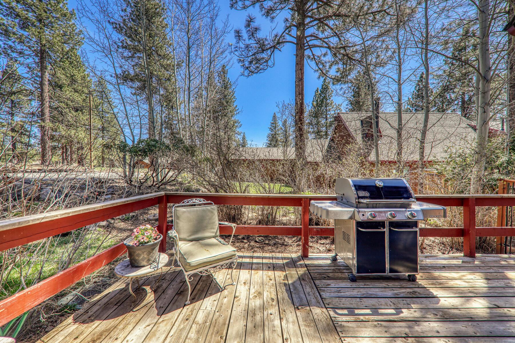 10243 Laburnham Circle Truckee, CA 96161 - Photo 19 of 21 a picture of a table and chairs on the wooden floor