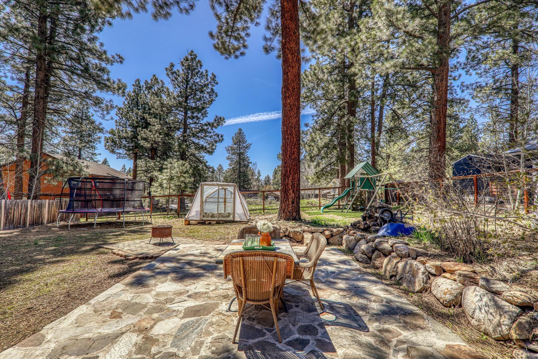 10243 Laburnham Circle Truckee, CA 96161 - Photo 2 of 21 a view of a backyard with sitting area