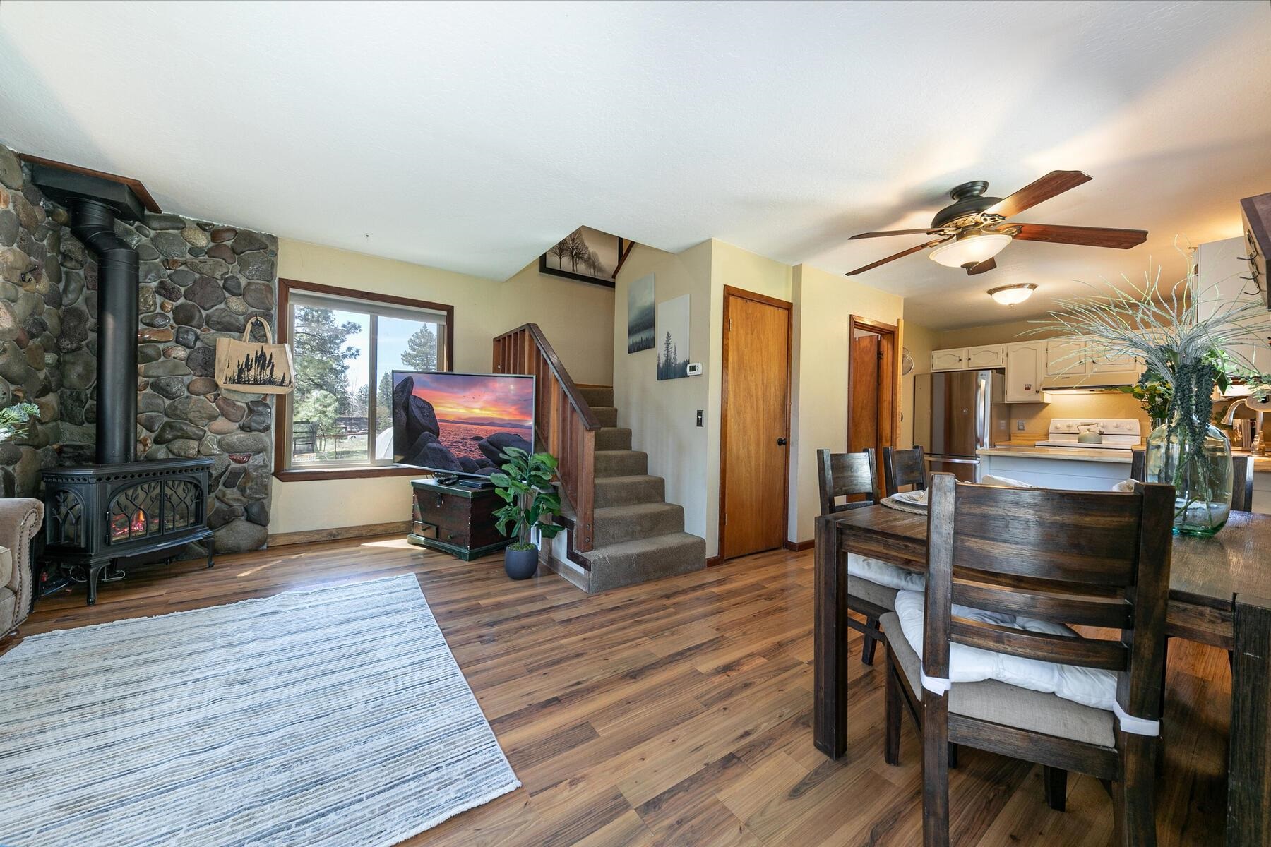 10243 Laburnham Circle Truckee, CA 96161 - Photo 5 of 21 a view of a livingroom with furniture and a flat screen tv