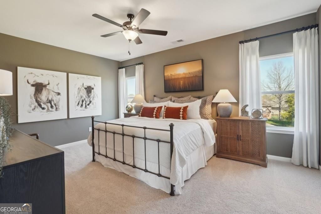 11 North Haven Drive Rome, GA 30165 - Photo 28 of 35 a bedroom with a bed and a flat screen tv