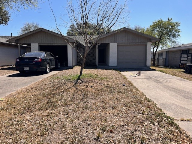 1200 Kline Avenue, Unit B Odem, TX 78370 - Photo 2 of 10 a car parked in front of a house